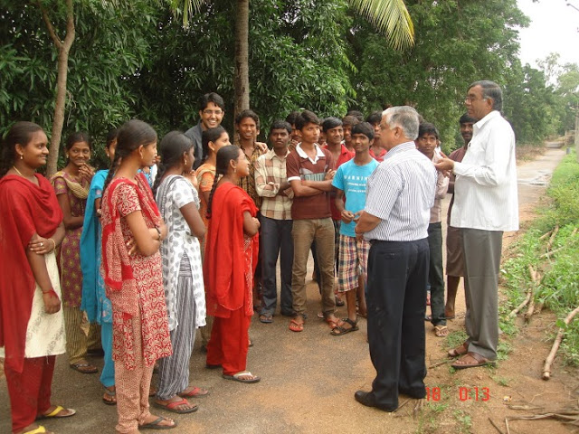 Mayee with students